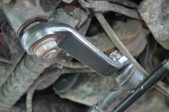 This will allow the shackle to move rearward. PHOTO 3 PHOTO 4 5.