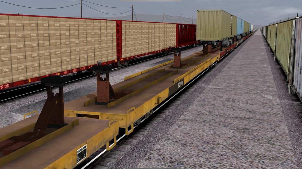 containers; or even a mixture of types. Supplied in the pack are three empty base flatcars in yellow, grey and red.