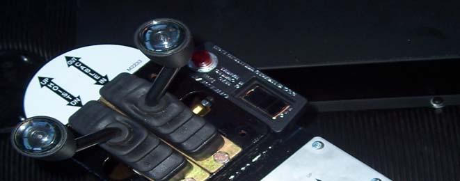 The control is located by the P.T.O. switch to the right of the driver (Ref.