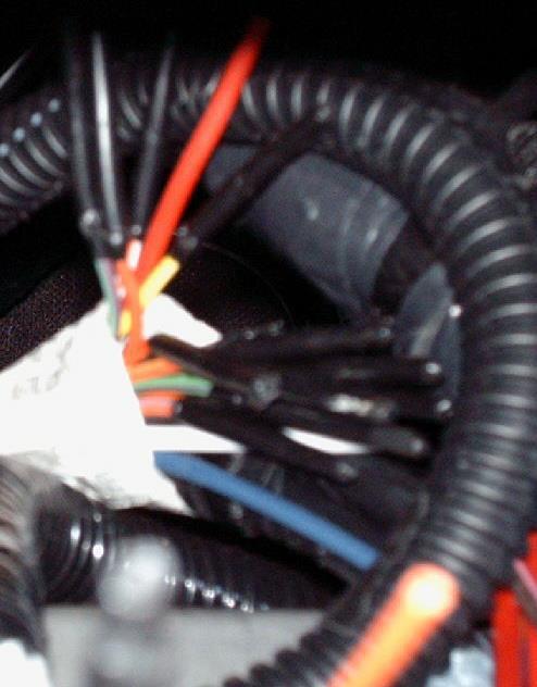 These pass-through wires terminate in the engine compartment in front of the cowl on the driver s side, behind the brake master cylinder.