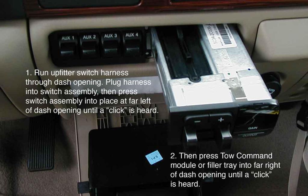 If you have Tow Command, press the controller in the opening on the far right side until it snaps in.