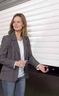 The manually operated roller garage door is mechanically locked using interior and exterior handles and a lock.