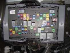 On some models it may be necessary to remove the fender/cowl brace to allow access to the fuse box 7-3.