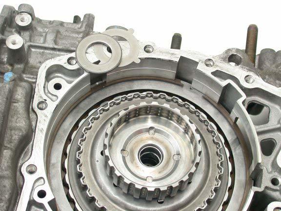 Install the (3) 2-4 clutch plates and (5) steel plates. 23.