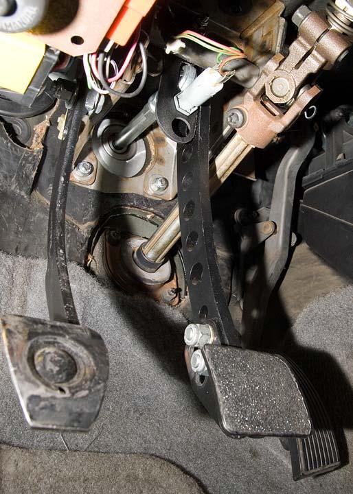 Driver Adjustments The OE brake pedal placement is considered by many drivers to be too high relative to the gas pedal. This makes heel/toe downshifting difficult.