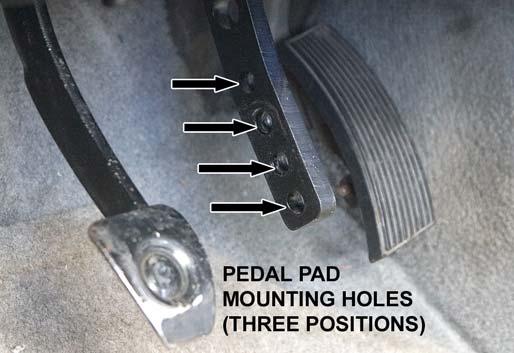 Position the MM Brake Pedal Pad at the desired location on the MM Brake Pedal Arm and slide the two (2) 3/8" bolts through the appropriate mounting holes. 45. Reconnect the negative battery terminal.