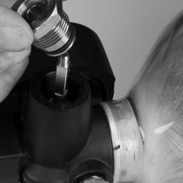 Screw the packing gland into the cylinder valve. 14. Tighten the locknut until it is flush with the stem. 15.