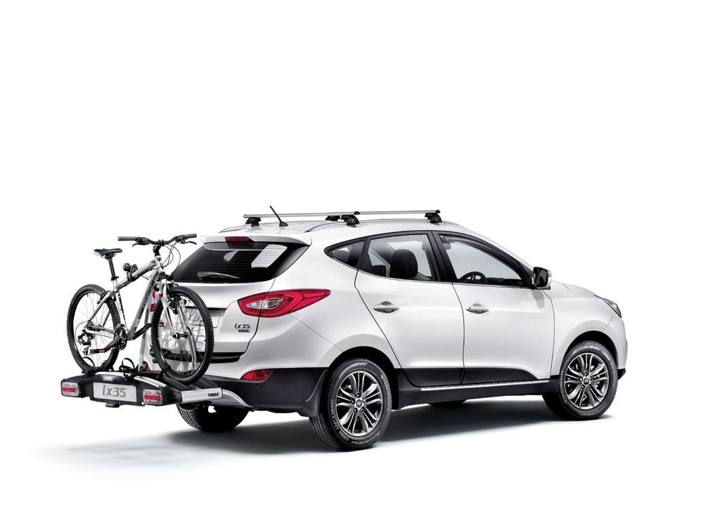 Add a roof mounted bicycle carrier for adventurous family trips,