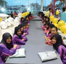 150 children from age 7 to 18 broke fast at Jimisar Autotrade s Kuching 3S showroom.