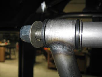 After insert the control arm bolt from the front to the rear and place the supplied flat washer between each side of the polyurethane