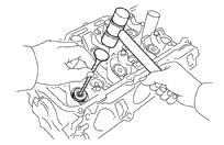 () () () (1) (b) Install the valve (1), spring seat (), valve spring () and spring retainer (). P1668 SST (c) Using SST, compress the valve spring and place the keepers around the valve stem.