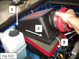 20. Install the upper air box by lowering the hinge side into place first. (Fig. D22) i.
