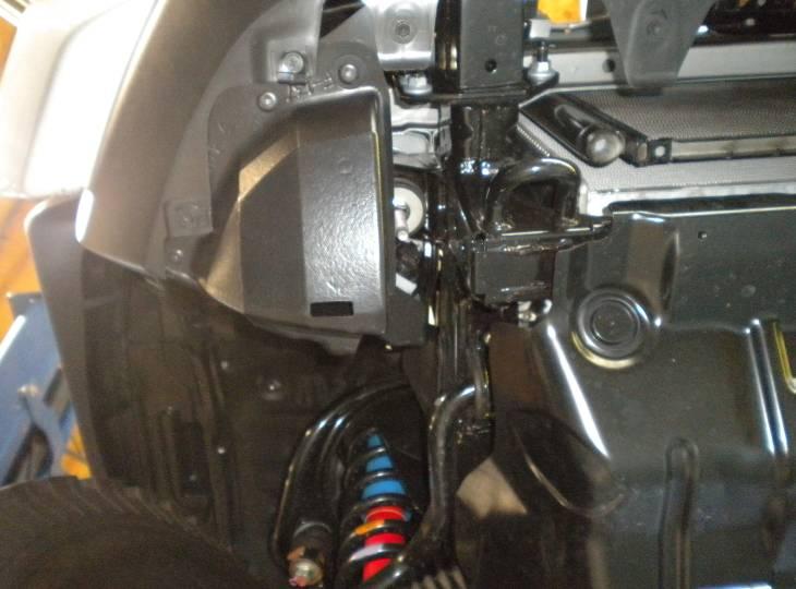 Install the air box clips by pulling straight up on the clips to engage the air box. (Fig.