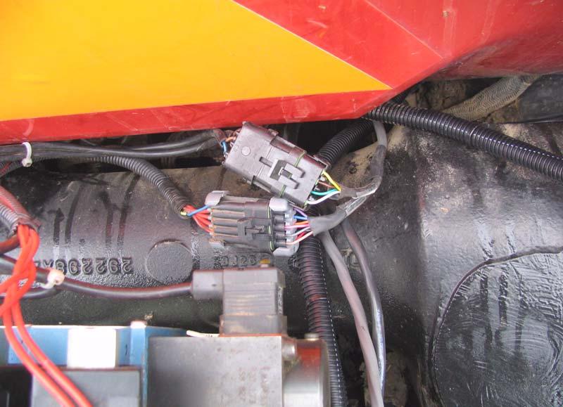 Connect the SA Module Harness to the Hydraulic Valve Connect the SA Module Harness to the Hydraulic Valve Route and secure the steering cable from the SA Module to the hydraulic valve as shown in