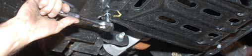 Using a 21mm socket remove the brake
