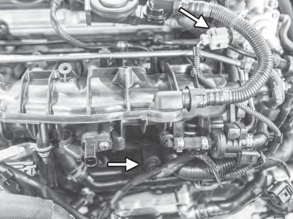 13) Remove the four T30 bolts connecting the throttle body to the intake manifold. Remove the throttle body from the car.