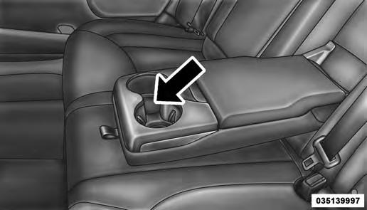 188 UNDERSTANDING THE FEATURES OF YOUR VEHICLE Rear Seat Cupholders The rear seat cupholders are located in the center armrest between the rear seats.