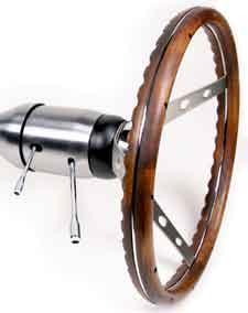 Steering Wheel: OEM Wheel Aim the road wheels so they are pointing straight ahead. Lower the stock steering wheel onto the column and center it in its proper position.