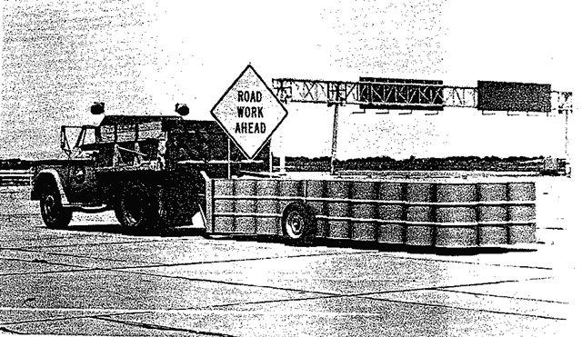 Cushion Trailer. This trailer, shown in Figure 1, consisted of several 20-gage 55-gallon steel drums with 8 inch holes in the top and bottom and mounted on a set of wheels and a trailer hitch.