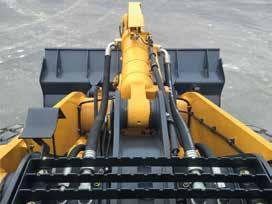 A panoramic view cab with curved front glass and with wellpositioned lift arms allow the operator a clear line of sight to the bucket edge at ground level.