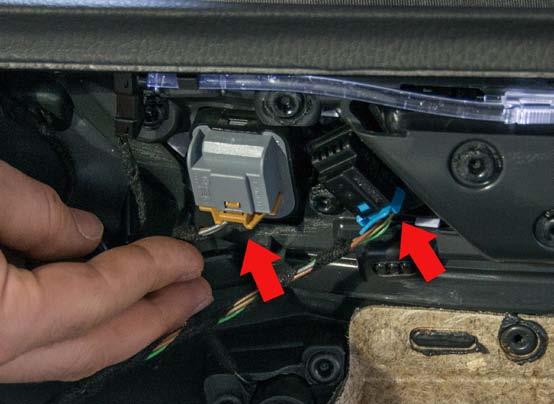 6. Unplug the connector for the power mirrors