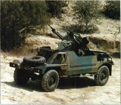 4x4 VEHICLES with twin 20mm cannon, to provide more stable firing platform, stabilisers lowered to ground before firing. Close-range anti-tank has 106mm M40 recoilless rifle.