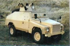 Shorland Armoured Patrol Car (UK/Australia) AKEY RECOGNITION FEATURES Land Rover chassis with armoured engine compartment front, crew compartment centre, commander and driver each have