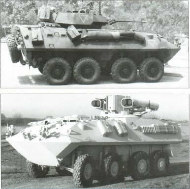 8x8 VEHICLES LAV anti-tank has three-man crew, same turret as M901s. Improved TOW vehicle has two TOW in ready-to-launch position. In service.