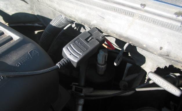 5 C44076 Kit Only: Locate the diagnostic connector under the dash on the drivers side. Connect the male plug of the harness to the factory diagnostic connector.