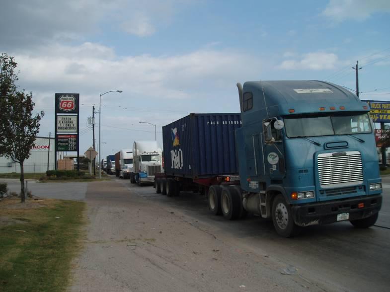 Figure 3. Heavy truck traffic and poor pavement conditions along Barbour s Cut Boulevard. Trucks entering the container terminal area need to undergo entry and exit checks.