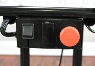Toggle the black switch for forward and reverse. Grasp and twist the throttle. To turn the cart off, simply push the red button in.