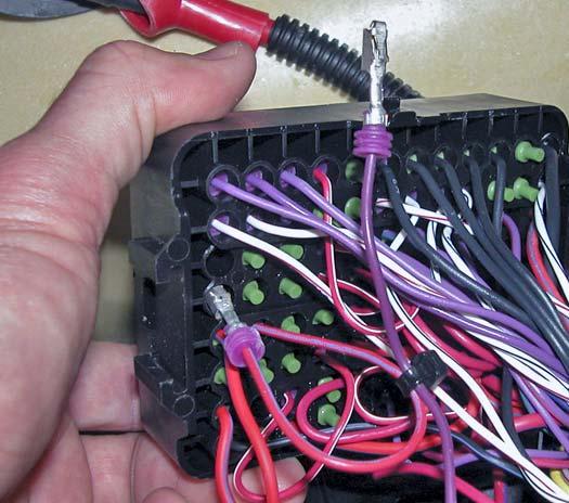 Insert other end of red wire with purple stripe (supplied item #4) into location E11. (Listen for a click!) Pull back on wire to ensure terminal is locked in place.