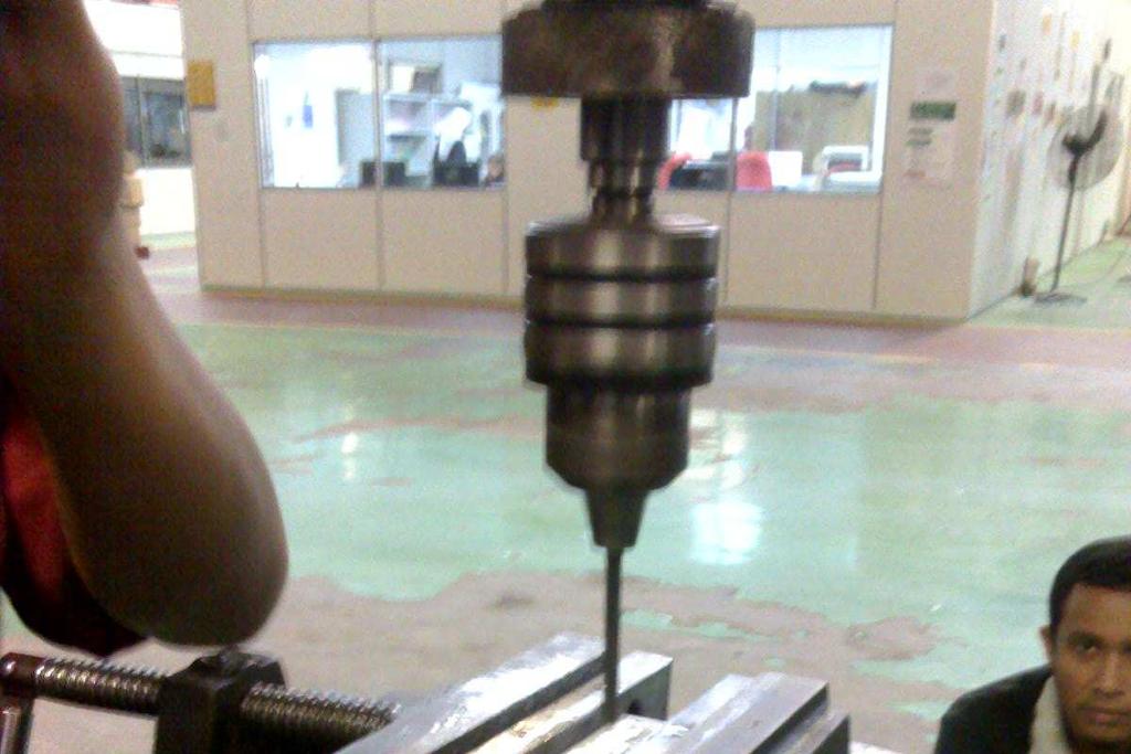 24 c) Drilling Process This process progress is when the material has been measured and marking to drill. The hole position is measured and mark using equipment like steel ruler and steel marker.