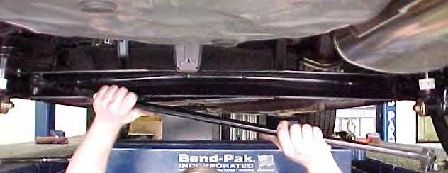 2) Use a 19mm socket or wrench to loosen the factory hardware holding the rear sway bar in place.