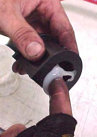 8) Use the grease pack provided to apply a thick coat of grease to the inside of the new sway bar bushing.