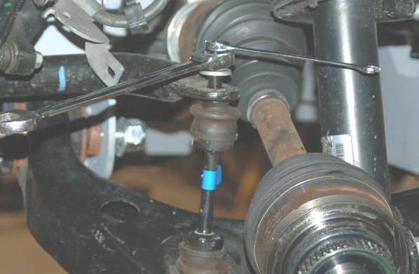 wrench on sway bar links on the  See Photo 46.