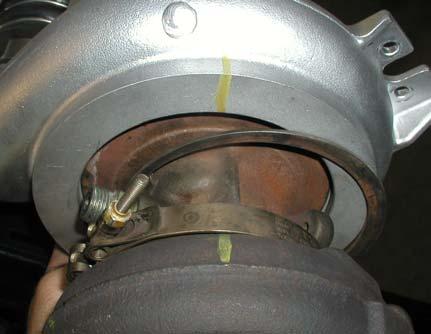 Align the oil feed fitting with the letter L in the Holset name on the turbine housing.