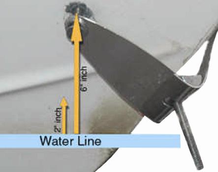 The upper most tip of the prop should be no lesss than 5 (12 cm) below the surface of the water. 2. Remove Two-Sided Tape Remove the two sided tape on the back of the clamp strap.