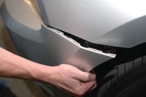 The fascia is attached to the fender at the seam with a series of