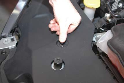 73. Replace the radiator cover utilizing the original push-pin rivets. 74.