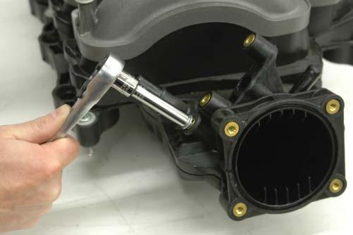 Remove the PCV Spigot from the OEM intake manifold using an 8mm wrench. 87.