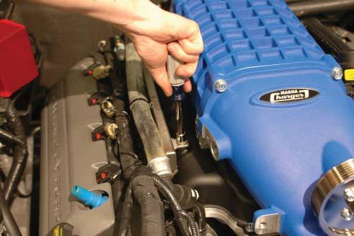 Take care that the heater hoses will end up above the fuel rails, and pay attention to the adjacent hoses.