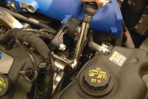 Connect the throttle body extension harness to the throttle body plug at the end of the throttle body