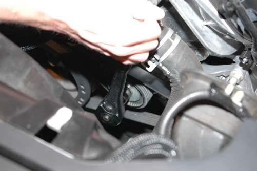 Pull on the fuel line, you should not be able to pull it free without dis-engaging the locking clip. 114.