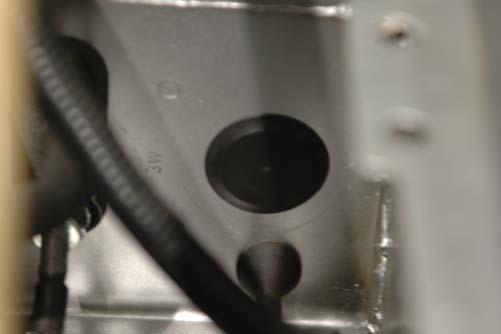 Remove the air tube from the OEM fi lter box to the throttle body using an 8mm socket or fl at
