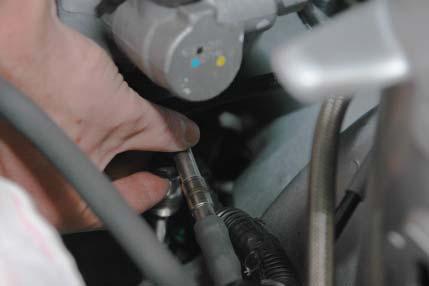Press the fuel line onto the barb, insert the fuel line removal tool and press it fi rmly into the fuel line,