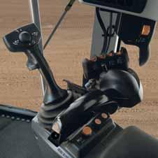 trigger shifts transmission to forward, neutral or reverse 6 Gear Selection: Two yellow thumb buttons upshift and downshift 7 Left moldboard lift cylinder: Push joystick to lower, pull joystick to