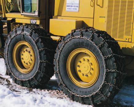 Motor graders are frequently required to cut hard packed snow or ice off roadways or city streets.