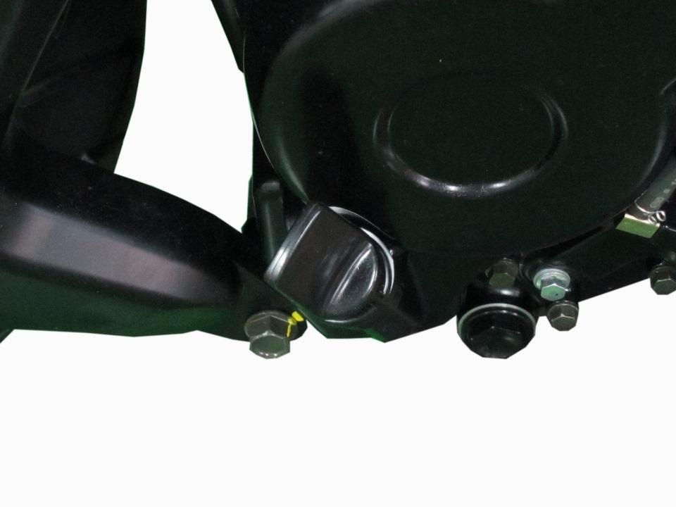 2. Periodic Maintenance > Engine Oil XCITING 400i The oil filler cap/dipstick is located on the right side of the engine.