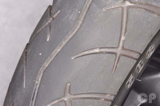2. Periodic Maintenance > Tires XCITING 400i Replace tires if the tread depth reaches the wear